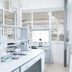 Interior of empty  science laboratory with modern equipment, copy space